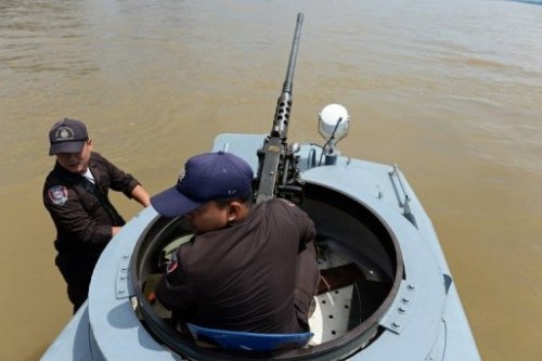 Thai Marine Border Police patrol along the Mekong river, deep in the territory known as the Golden Triangle, May 28, 2013. Tun Nay Soe of the United Nations Office on Drugs and Crime (UNODC) in Bangkok, said the level of production of both meth and opium were at "alarming levels" in the Golden Triangle area. 