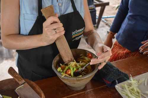 Making Tam Mak Houng in Nouk’s custom-built garden kitchen
