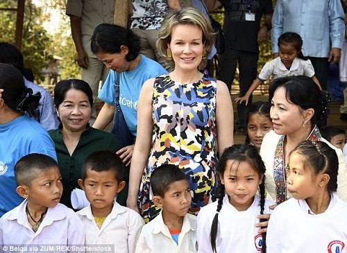 Belgium's Queen Mathilde Swaps Heels For Trainers As She Tackles Steep Stairs At A Laos Temple