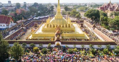 Time-Honoured Wax Castle Procession Pays Homage To That Luang Stupa